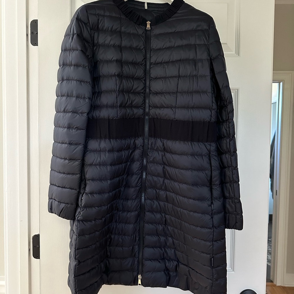Beautiful limited edition navy Moncler lightweight down coat.  Only worn once.